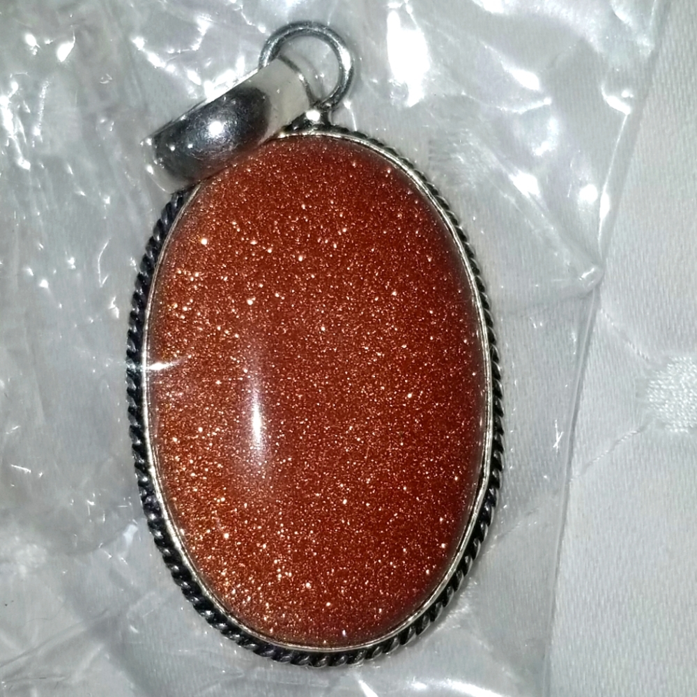 Glittering sandstone pendant